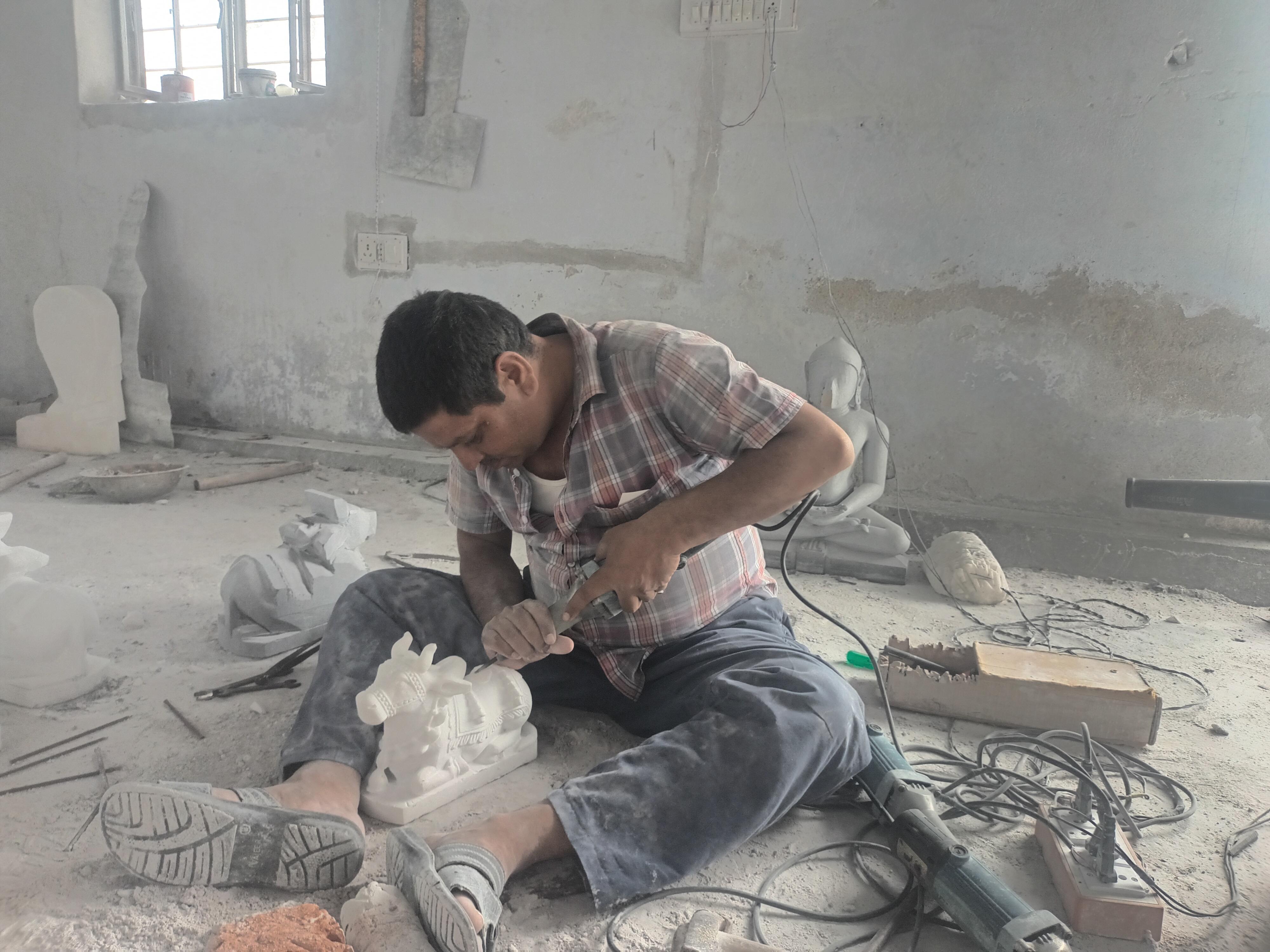 Carving the Final Marble Statue